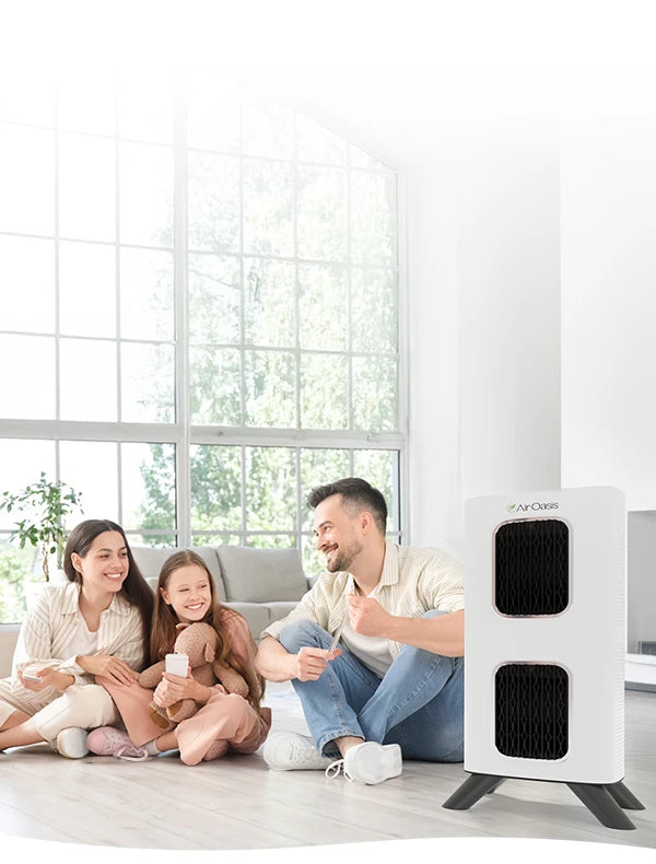 a family sitting on the floor with their dog in a living room with an iAdaptAir air purifier